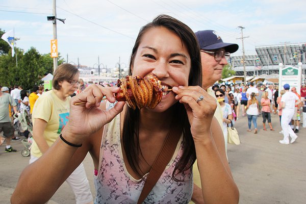 Girl Eating a Loaded Twister Dog.jpg