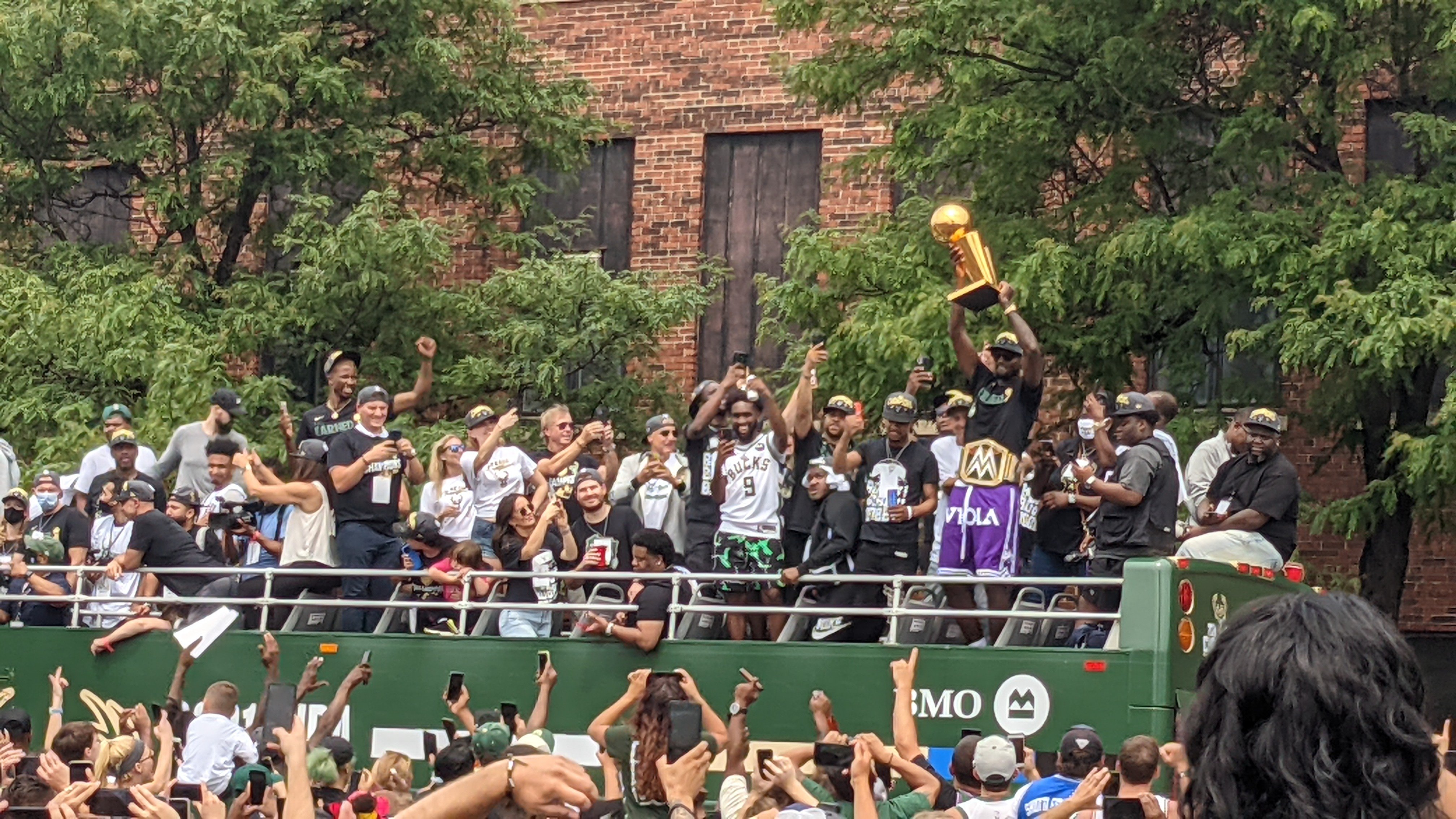 Packers players celebrate Milwaukee Bucks winning NBA title