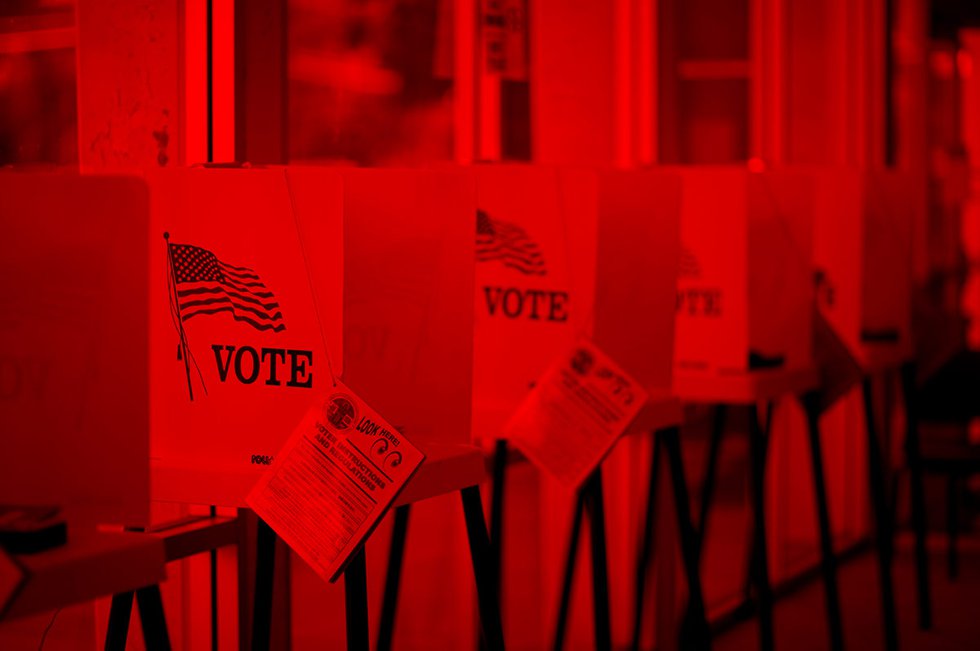 Voting booths with red overlay