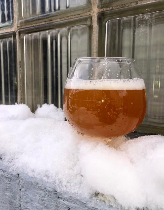 Saison beer in snow at the Sugar Maple