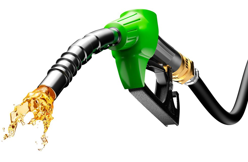 Gasoline flowing from pump nozzle