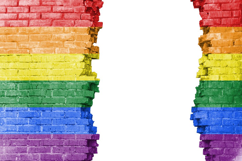 Broken brick wall in Pride colors