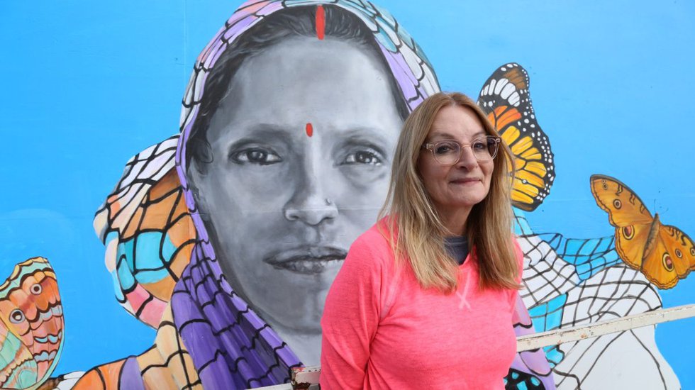 Milwaukee muralist Nova Czarnecki with Ranjana Maurya mural