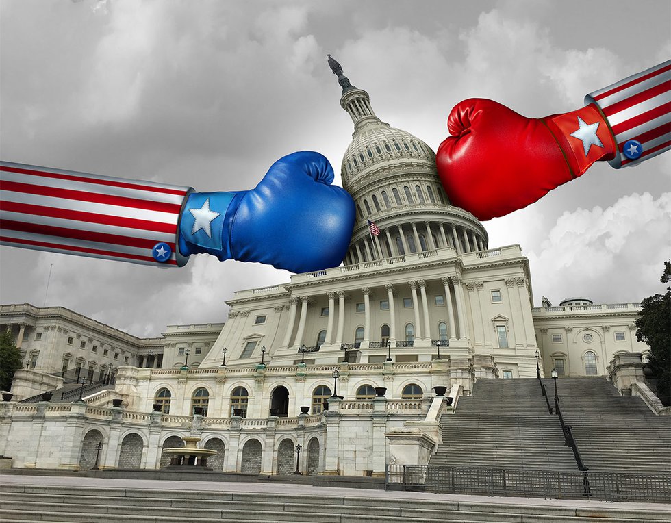 US Capitol being punched by red and blue boxing gloves