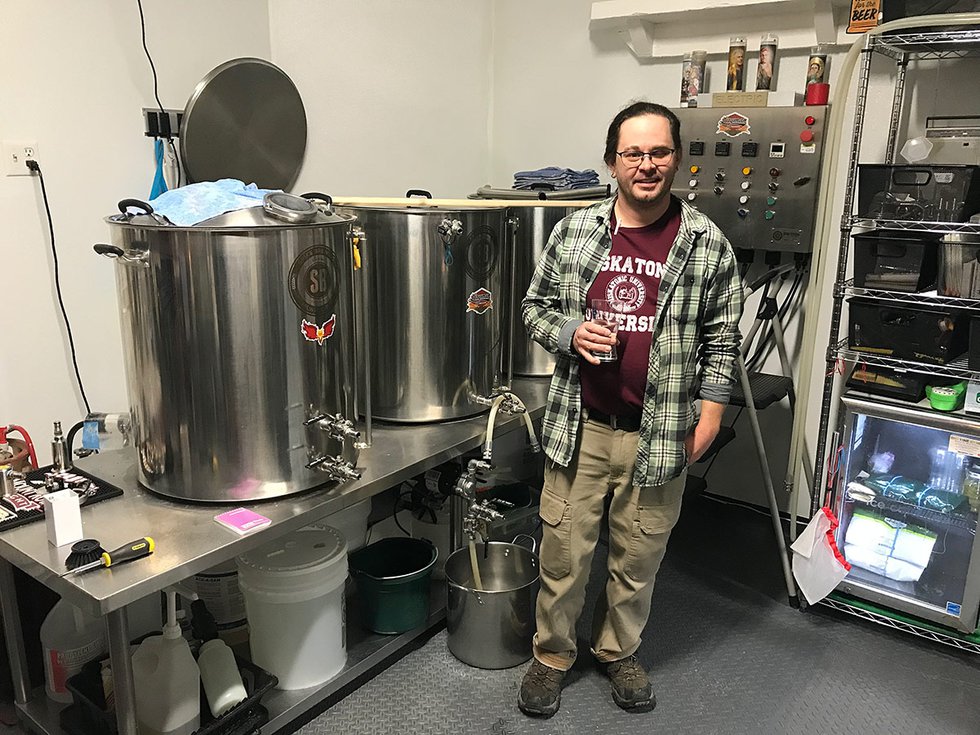 Kyle Ida with Layman Brewing kettles