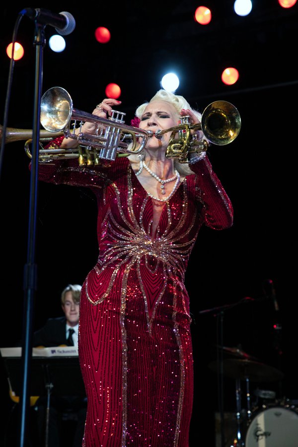 Gunhild Carling playing three horns at the same time.