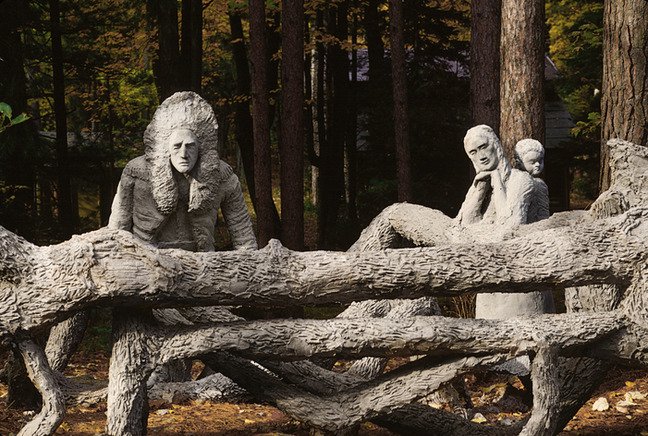 James Tellen Woodland Sculpture Garden (site detail, roadside fallen log fence with Native Americans and bears tableau, 1997), Black River, WI