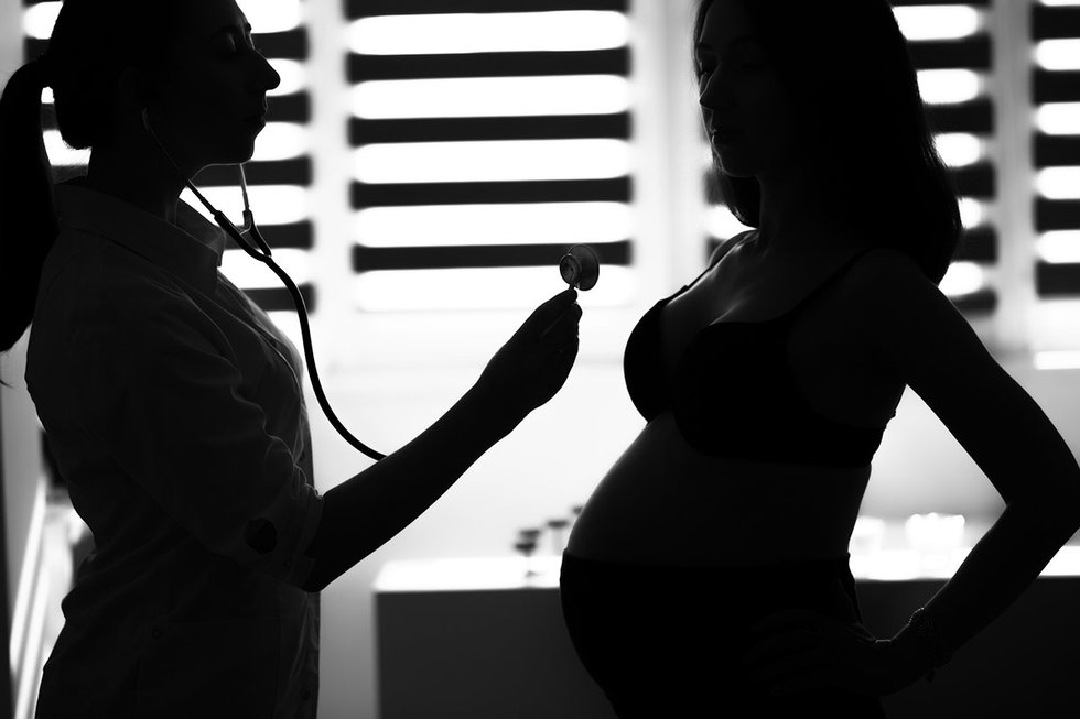 Doctor with pregnant woman