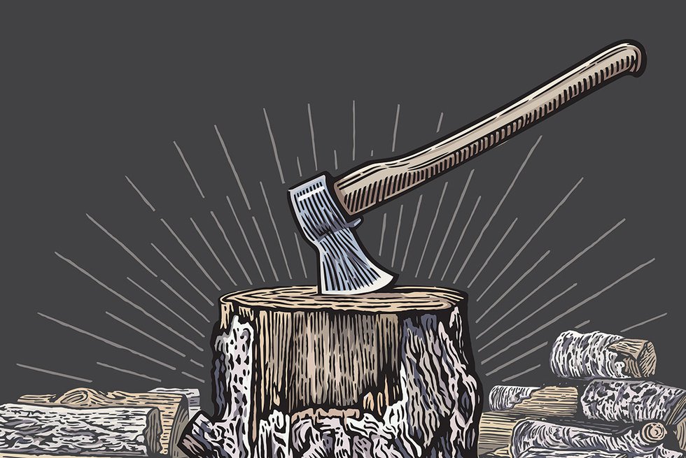 Axe in stump and wood pile