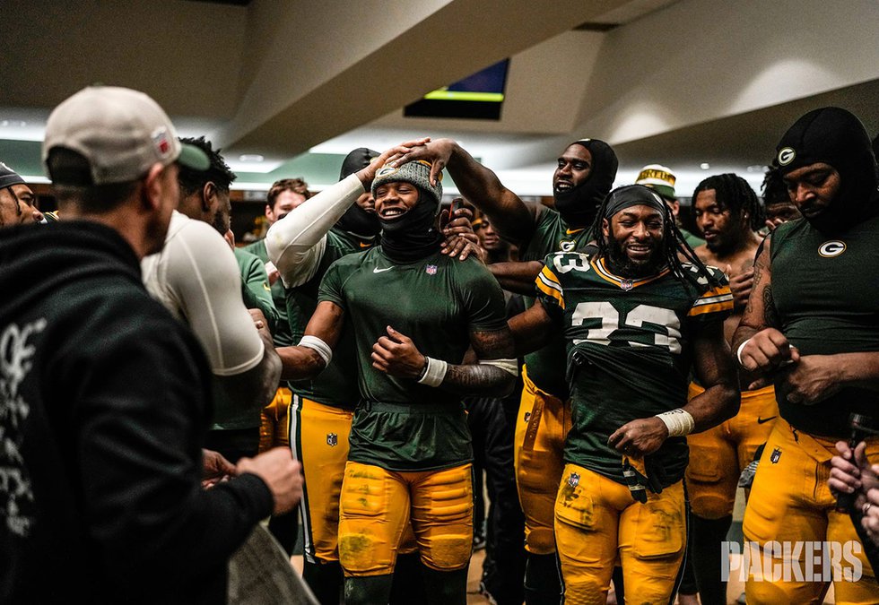 Packers locker room celebration January 7, 2024