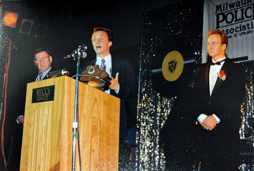 Louis Fortis accepting Milwaukee Police Association award