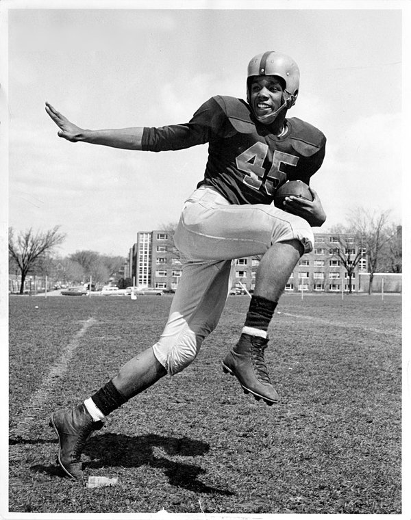 Dejustice Coleman as a University of Illinois halfback circa 1957