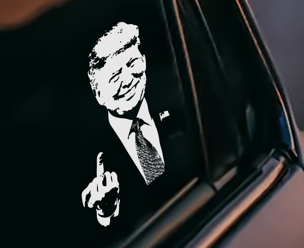 Trump flipping off sticker