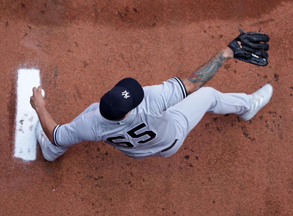 Nestor Cortes pitching viewed from above